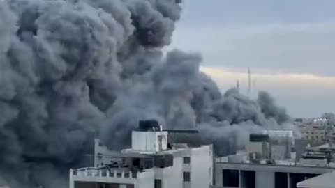 Israeli jets level the Palestine Tower, one of the largest buildings in Gaza.