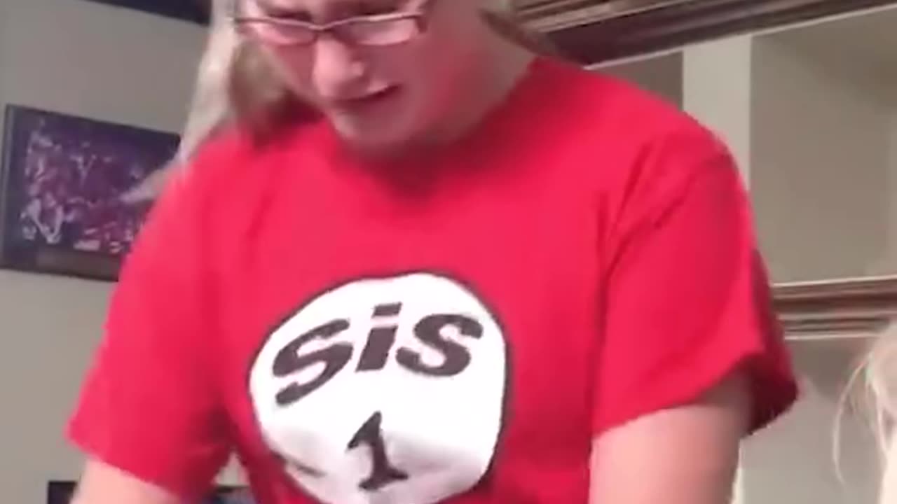 Girl drops new iphone within seconds of opening it