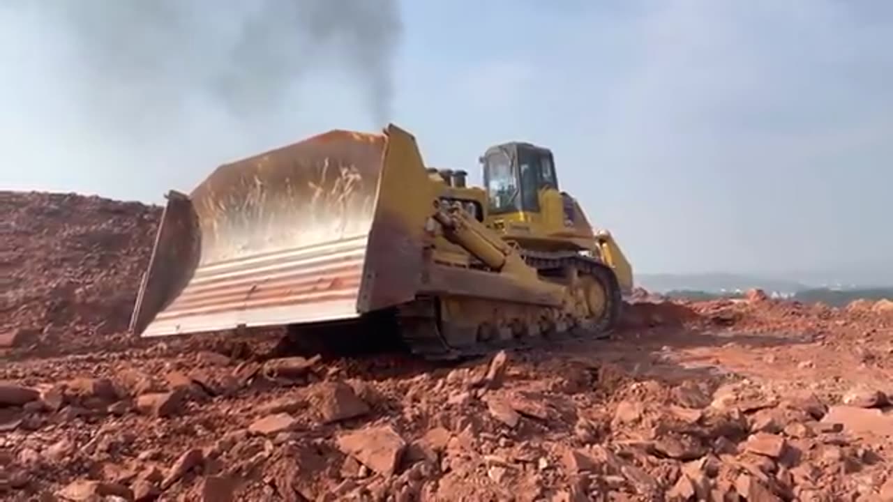 The biggest bulldozer in the world Komatsu D575 working in the mountains