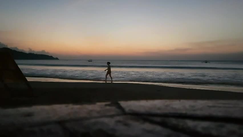 Children having fun in front of beach