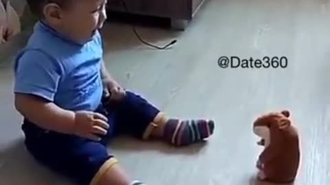 Baby afraid of toy