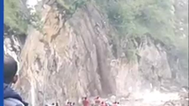 Devastating landslide sweeps roadway off mountain
