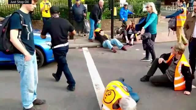 Motorists drag Just Stop Oil protesters off central London road