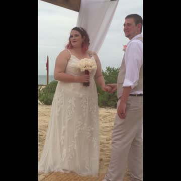 Husband’s Overly Aggressive Wedding Kiss Tackles Wife To The Ground