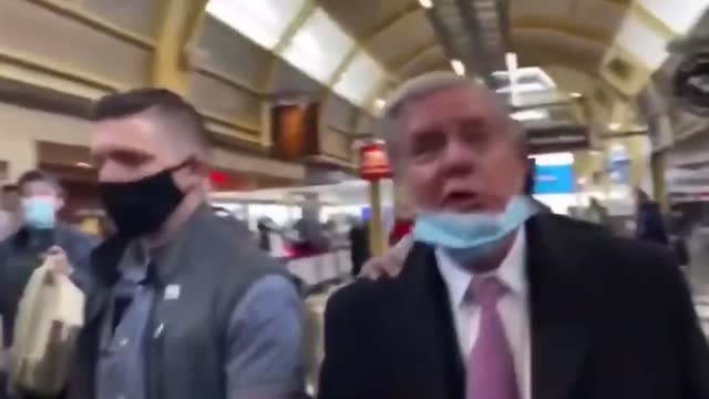 Lindsey Graham Confronted In Airport by Trump Supporters