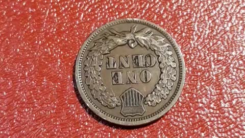 1864 Indian Head cent penny, reverse is 180 degrees off.