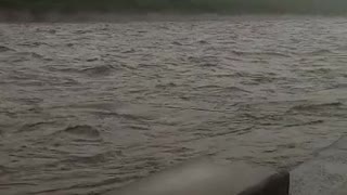 The canal next to Mondi Paper Mills is seen nearly overflowing.
