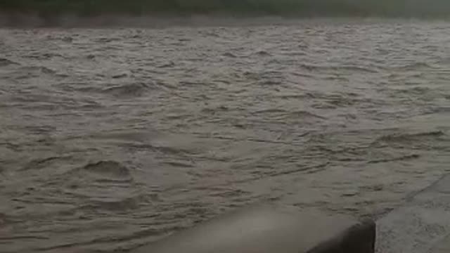 The canal next to Mondi Paper Mills is seen nearly overflowing.