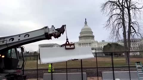 Federal authorities are reinstalling fencing around the Capitol as Washington prepares for truckers