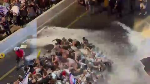 Israeli authorities deploy water cannons in Tel Aviv in attempt to disperse