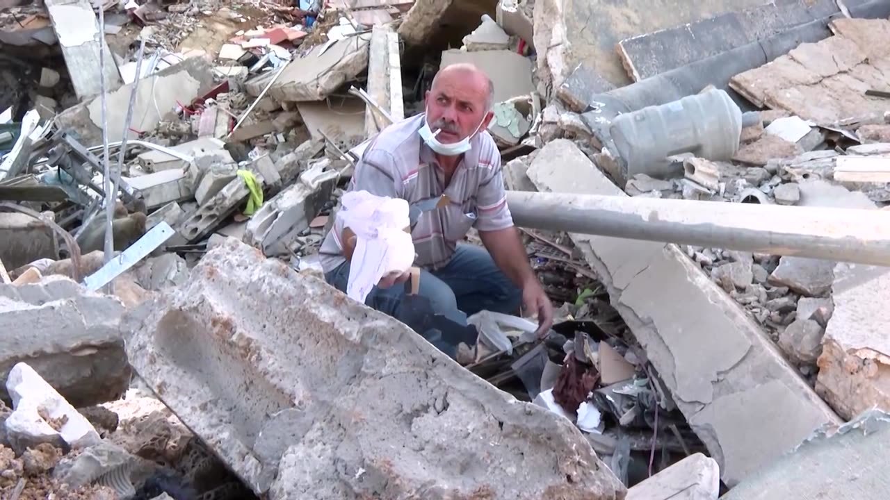 Beirut residents scour rubble after Israeli strike levels building