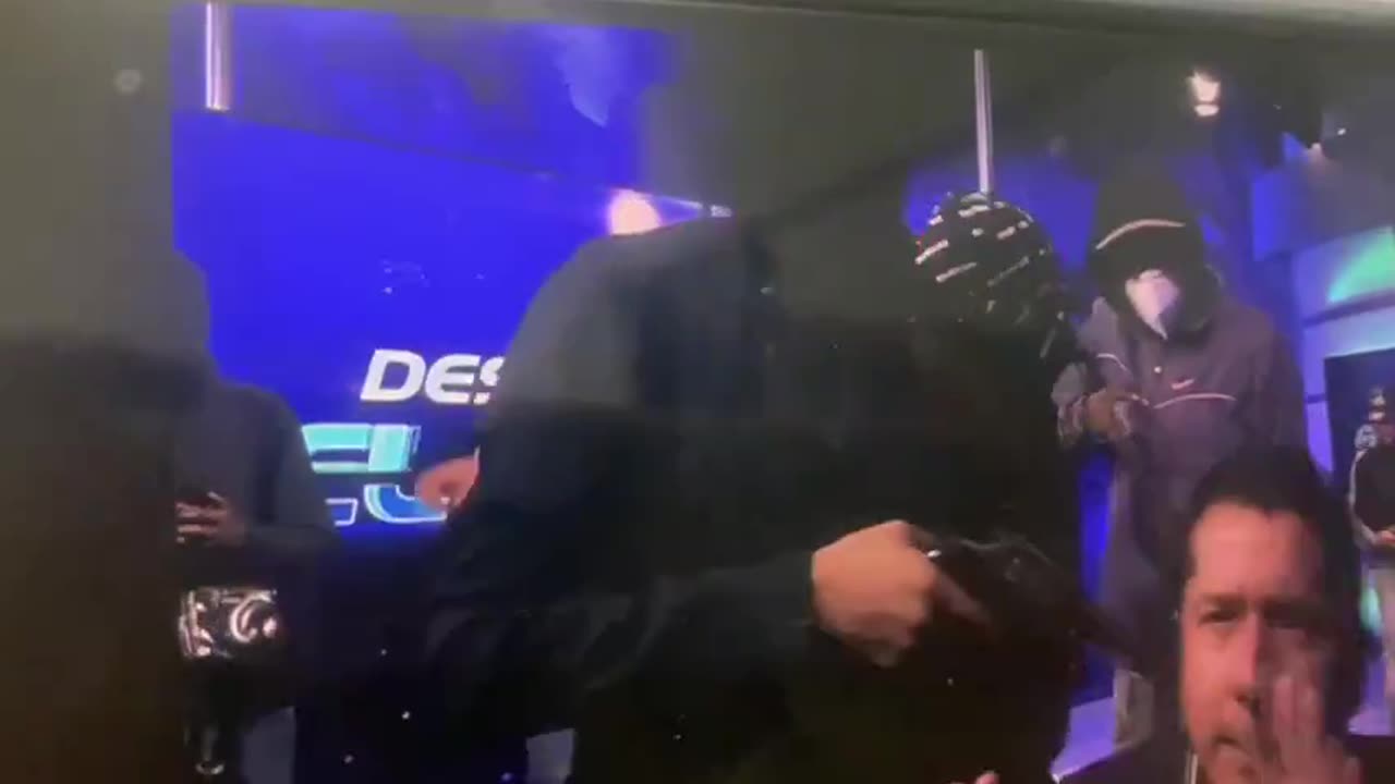 "Gunmen storm Ecuador television studio, take hostages!"