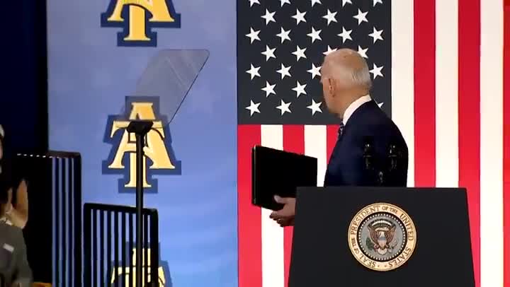 Biden ends speech by handshaking air, ‘talking to flag behind him’