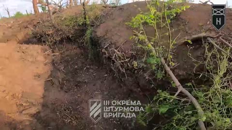 Ukrainians Evacuating a Wounded Soldier While Avoiding Russian Shells