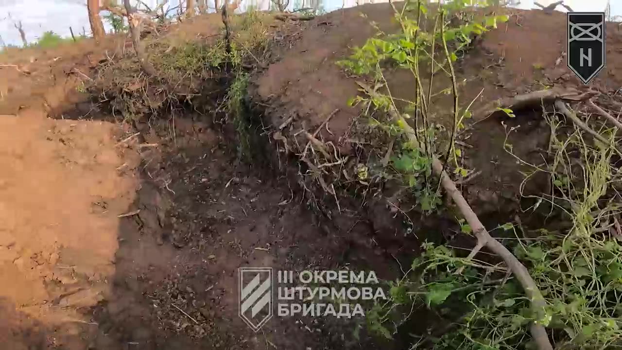 Ukrainians Evacuating a Wounded Soldier While Avoiding Russian Shells