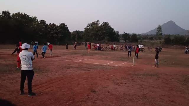 Indian village cricket playing