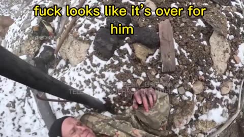 Stormtroopers of 1st AK evacuate an abandoned and wounded AFU soldier