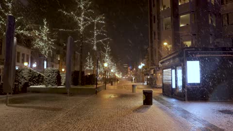 a quiet snowy city street