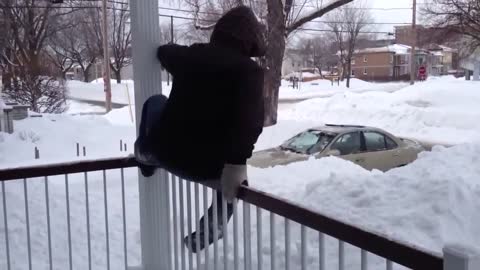 Dad Falls Headfirst Off House Into Snow