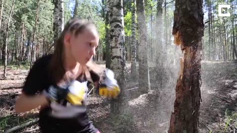 Little Girl Punches Down Tree Using Boxing Skills