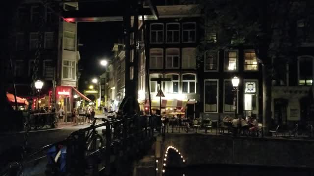 Amsterdam Netherlands friday night by the canal July 2018