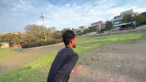 A boy Playing Cricket in Lahore