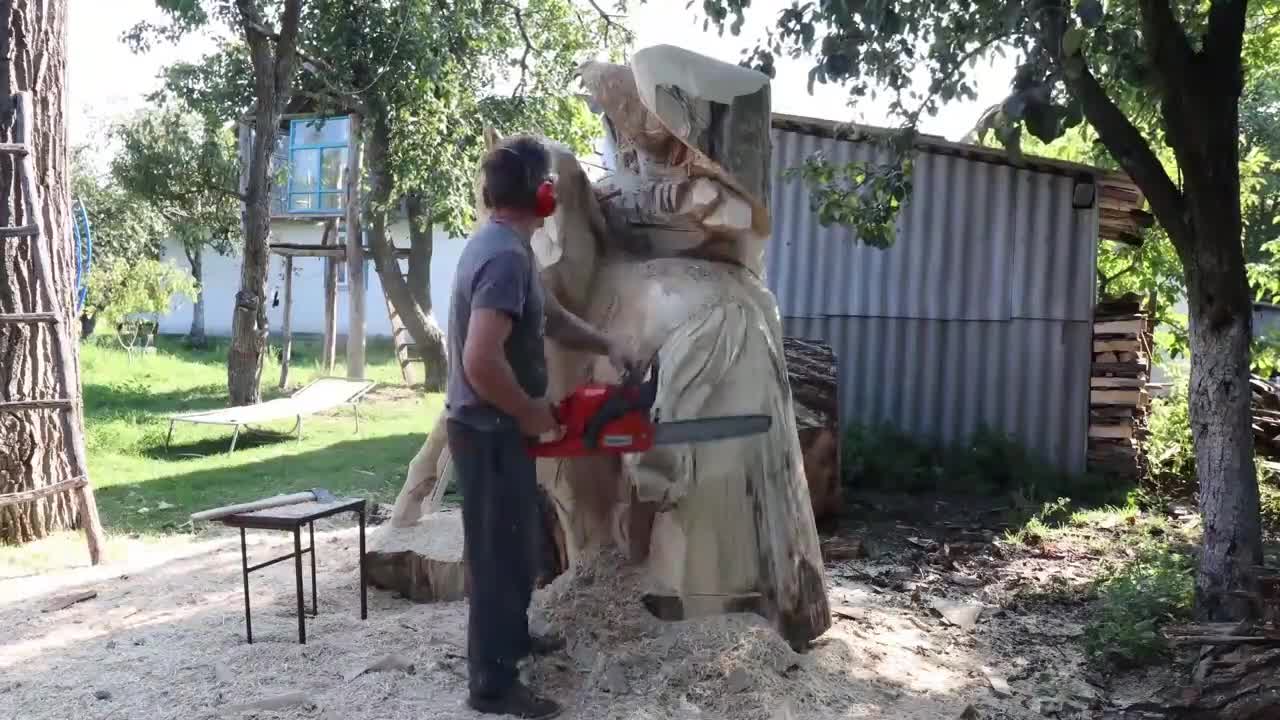The Native American girl of the large wooden masterpiece Horse and Eagle