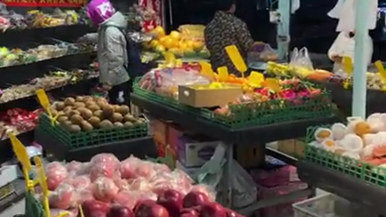 A fruit market in China in the night market.