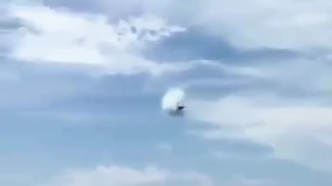 Vapor cone around a transonic F-18.