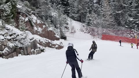 Snowboarder And Skier Have Mishap On Busy Slope