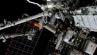 Watch: NASA astronauts spacewalk over a blue Earth