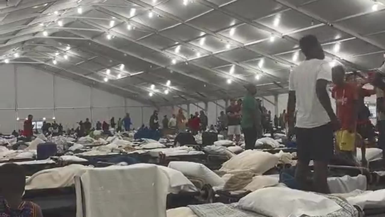 African migrants and Latin decent migrants at a migrant shelter fight