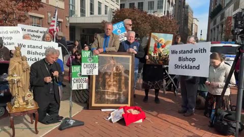 Hundreds of Catholics are led by Bishop Strickland in a rosary rally outside the US bishops' conference