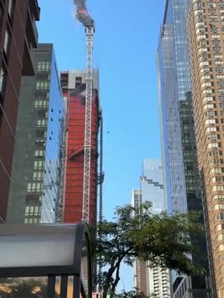 Crane in Manhattan, New York City, caught fire and subsequently collapsed