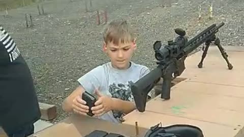 My son using AR15