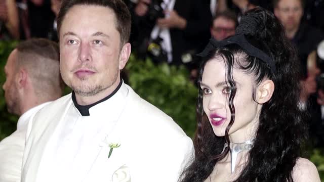 Elon Musk and singer Grimes call it ‘semi’ quits