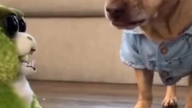 Artificial dog making face then real dog is shouting.