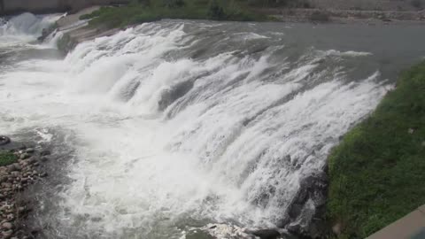 mighty river with large waterfall
