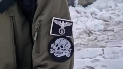 Ukrainian with nazi patches supporting Israel