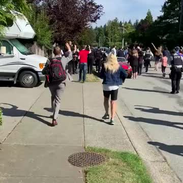 Trudeau chased by protestors during BC Campaign stop