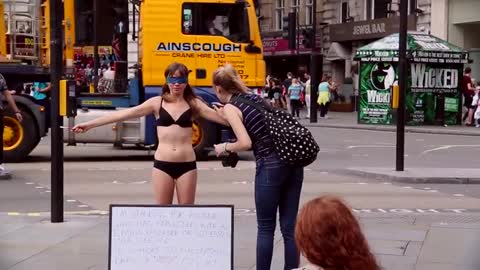 Girl Undresses in Public for Courageous Cause