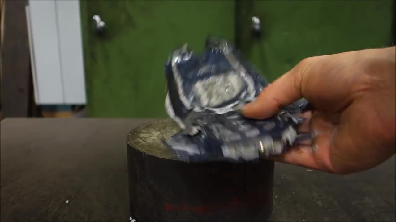 Crushing Nokia 3310 with hydraulic press