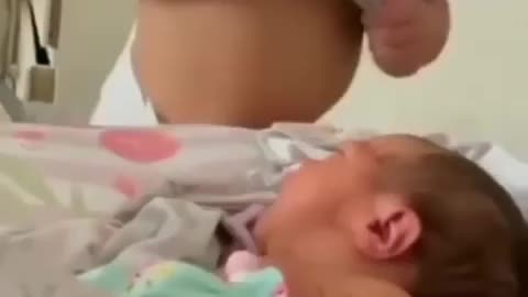 Child tries to breast feed another child