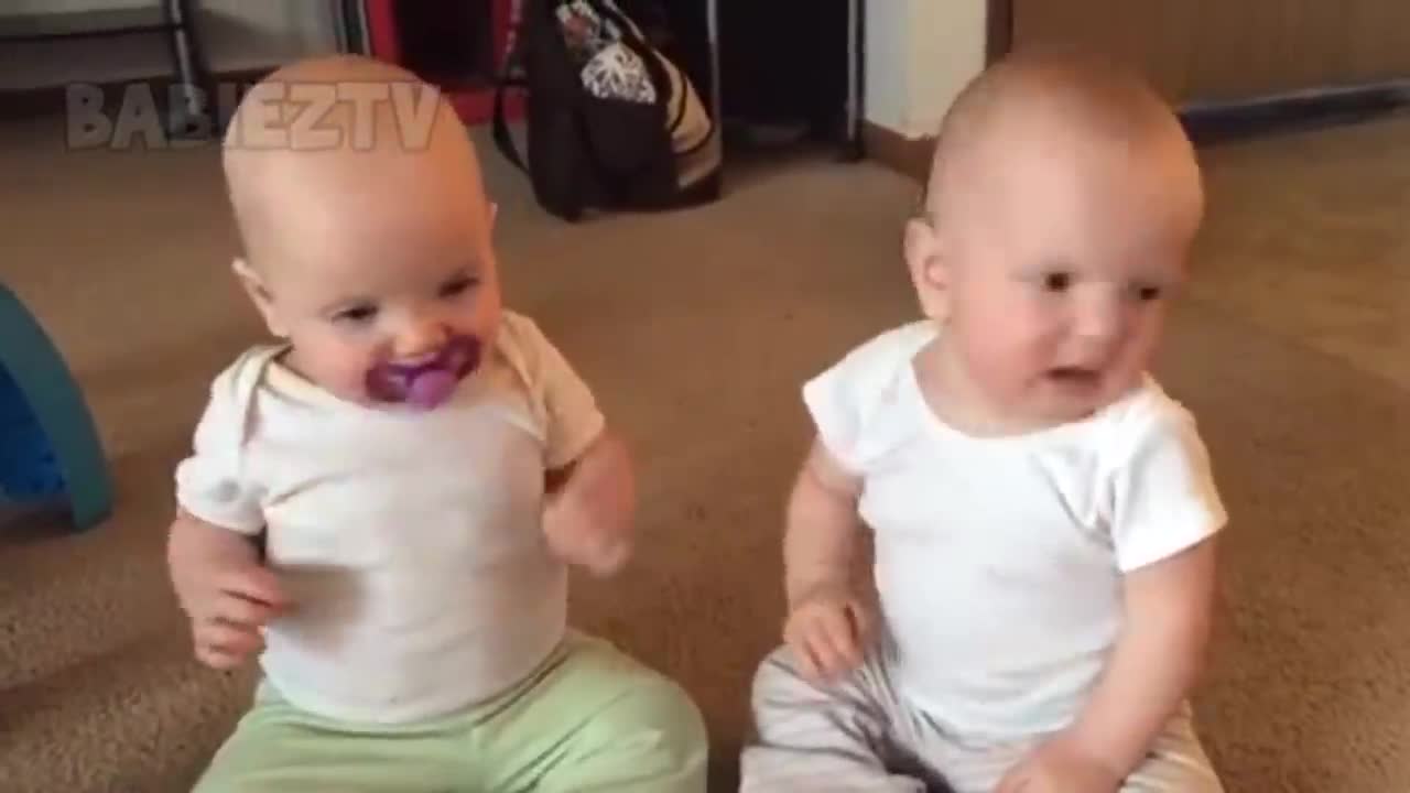 Funniest TWIN Baby Girls Fighting Over Pacifier