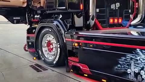 The big truck driver started the truck.