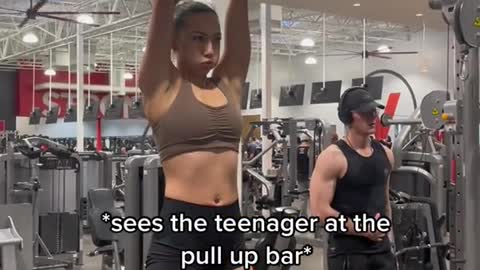 sees the teenager at the pull up bar*