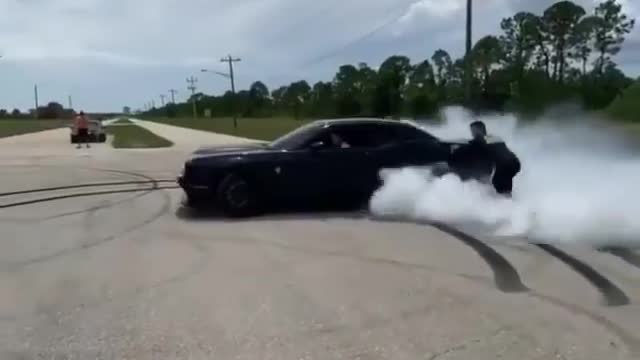 Angry dodge challenger burnout