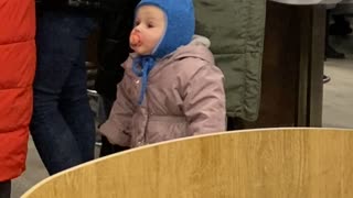 Kid Kept Close with Winter Leash