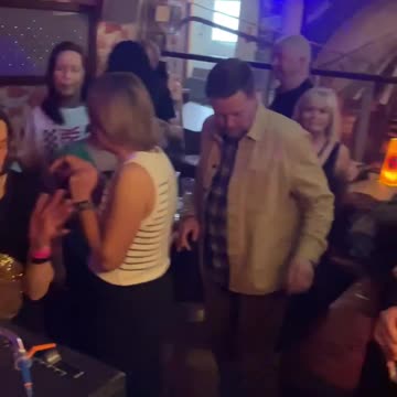 London Crowd Dancing to "The Storm Won't Last Forever" on Vinyl