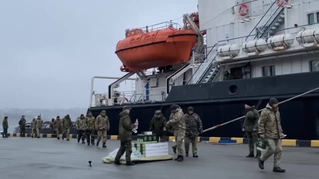 The video shows border guards who surrendered from Snake Island, near Odessa, who were called